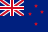 New Zealand flag with a blue field featuring the Union Jack in the top left corner and four red stars with white borders on the right side.