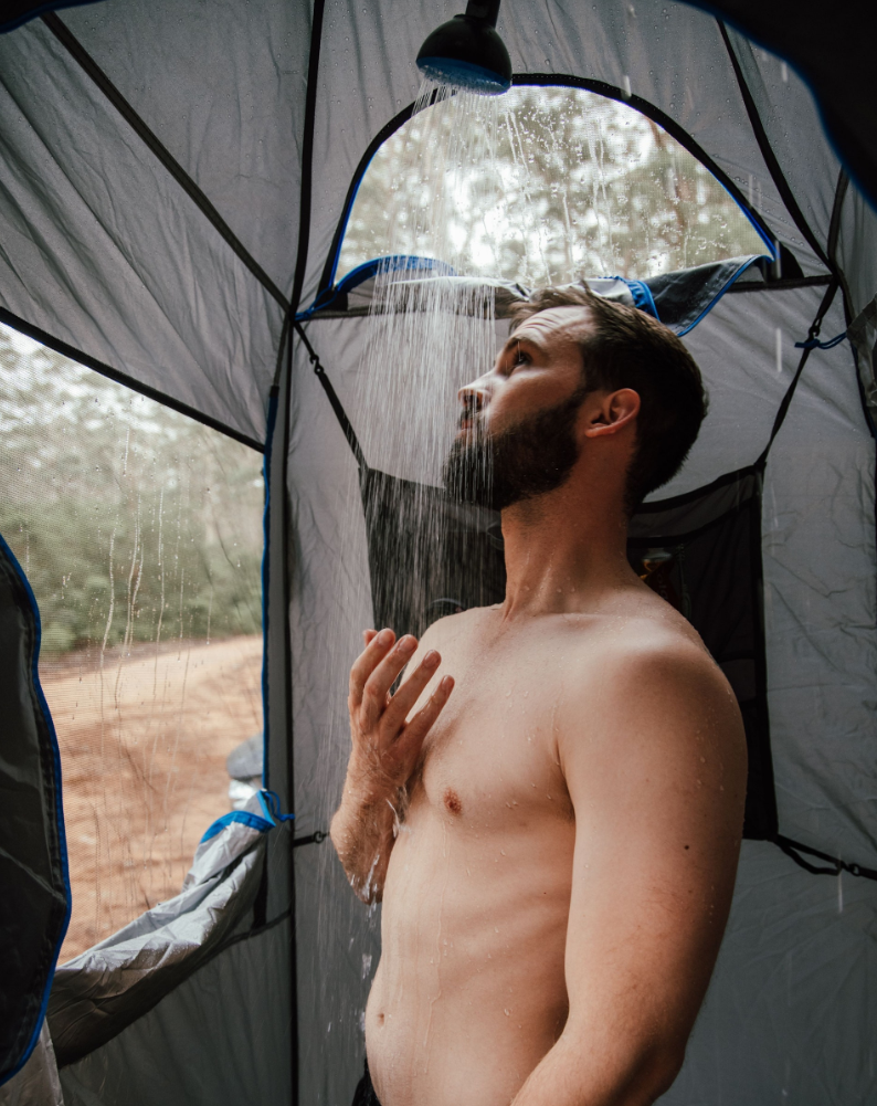 Person showering in ENSUITE Double with HOTTAP Integration