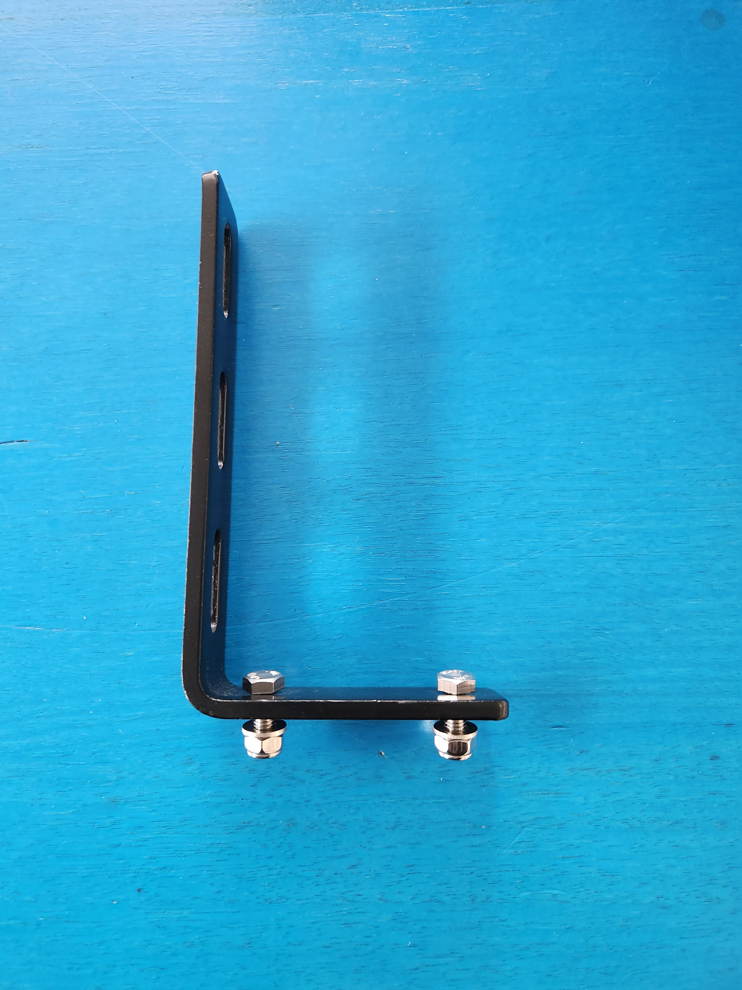 Ensuite Mounted Double - Mounting Brackets by Joolca, sturdy black metal bracket with bolts, designed for secure installation in outdoor portable hot water and shower systems.