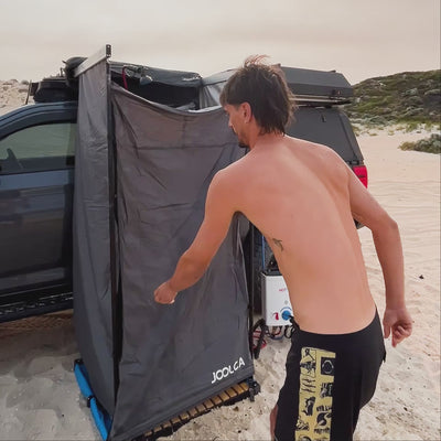 ENSUITE Mounted Double roof-rack shower tent in use